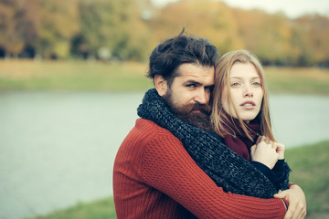 Fototapeta premium Young couple in autumn park