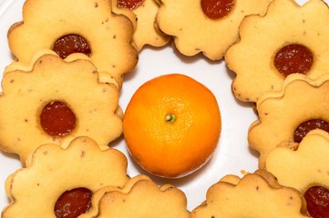 Homemade apricot jam Linzer with fruits close up top view