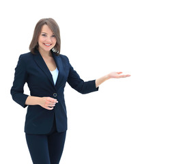 Smiling businesswoman showing open hand palm with copy space for