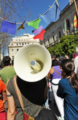 Women manifestation with megaphone