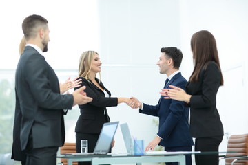 Business partner greeting each other with handshake