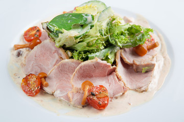Boiled eggs with smoked ham and vegetables