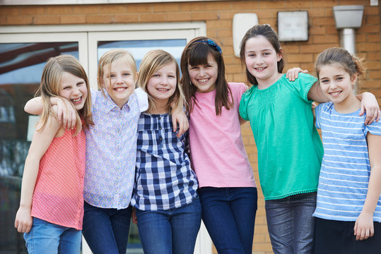 Portrait Of Female Pupils In School Playground