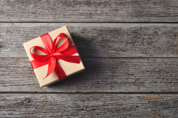 Gift box on wooden background