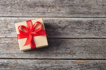 Gift box on wooden background