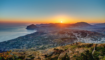 Sunrise seen from Erice in Sicily with the Monte Cofano in the back