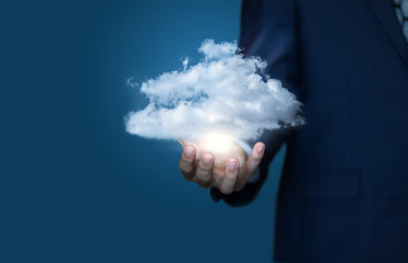 Clouds on hand. Cloud storage concept