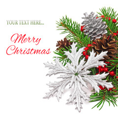 Naklejka na ściany i meble christmas decoration snowflake on a fir tree