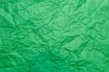 Grünes zerknittertes Papier als Muster