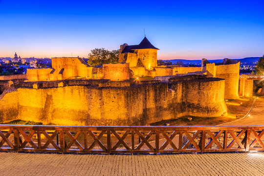 Moldavia, Romania. Ruins of Suceava fortress at twilight.