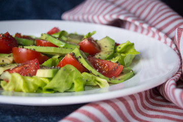 Avocado salad with cherry tomatoes and chia seeds