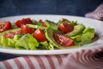 Avocado salad with cherry tomatoes and chia seeds