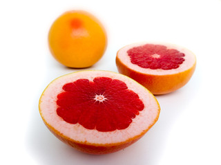 Grapefruit citrus fruit with half isolated on white with clipping path