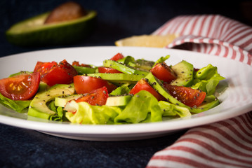 Avocado salad with cherry tomatoes and chia seeds