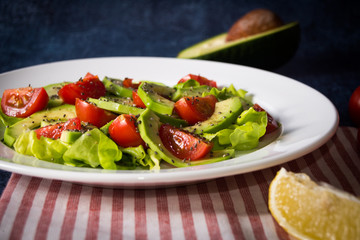 Avocado salad with cherry tomatoes and chia seeds