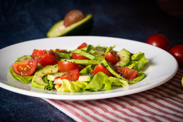 Avocado salad with cherry tomatoes and chia seeds