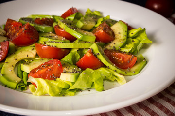 Avocado salad with cherry tomatoes and chia seeds