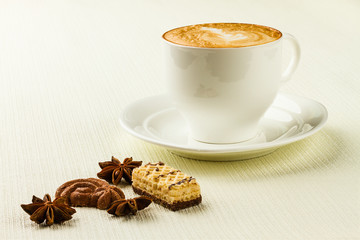 cup of cappucino, sweet and spices