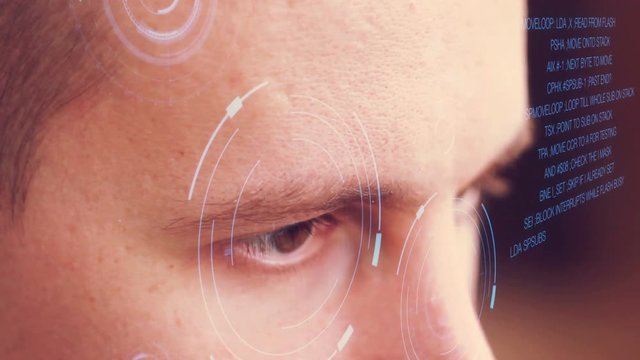 Computer programmer coding on futuristic holographic display