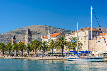 Town Trogir mediterranean scenic. / Waterfront view at mediterranean scenic in touristic famous destination, town Trogir, Croatia Europe - obrazy, fototapety, plakaty