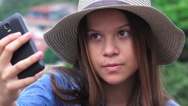Teen Girl Making Goofy Funny Faces For Selfy