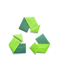 Paper folded origami recycling symbol environmental concept