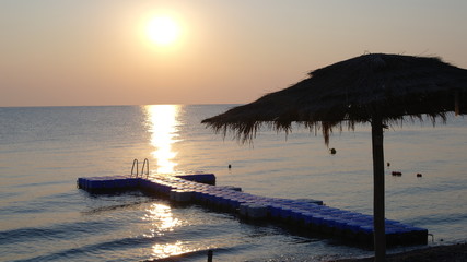 Sunrise over the waves