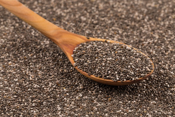 Chia seeds in wooden spoon