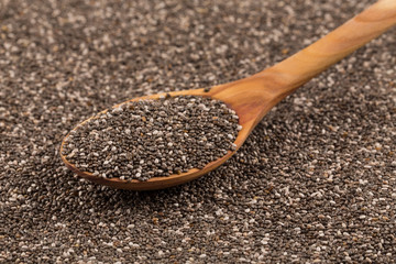 Chia seeds in wooden spoon