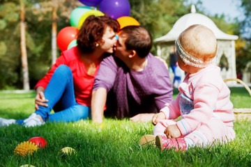 A happy family. Daughter's birthday one year.