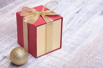 Gift boxes with bow on wood background