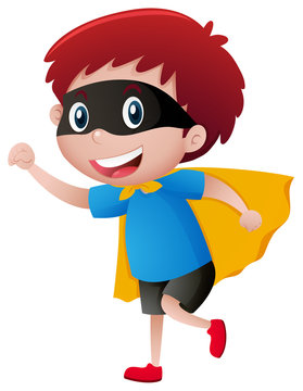 Little boy wearing mask and cape