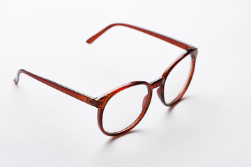 Brown-rim glasses with transparent lenses