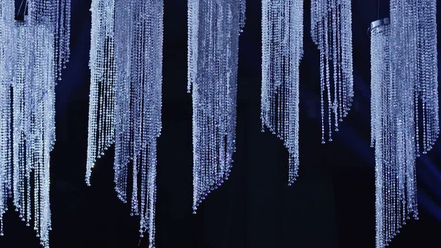 4K Shining crystal background. Crystal chandelier. Crystal stones. Slow Motion. Shot on RED EPIC DRAGON Cinema Camera .