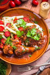 Chicken wings tomato sauce green beans rice