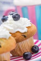 Sweet delicious muffins cream cranberries