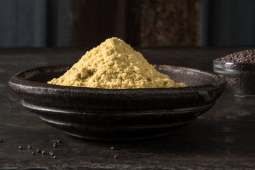 Ground Yellow Mustard in a Bowl