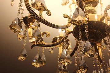 Brass chandelier with crystal.