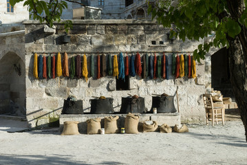Hand spun and dyed wool drying in the village centre of Göreme,