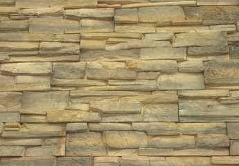 Yellow brick-tile wall texture