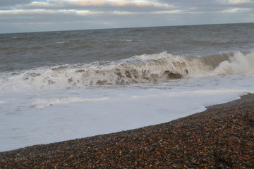 norfolk coast waves pebbled beach 