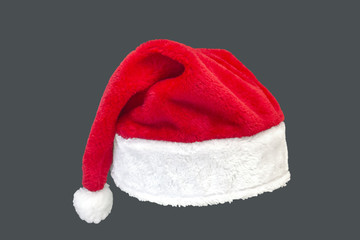 Bright and soft Santa Claus hat isolated on gray