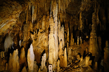 Okinawa, Japan - October 21, 2016: Gyokusendo Stalactite cave in Okinawa island, Japan. The cave was formed approximately 300,000 years ago and has 5000 meter long
