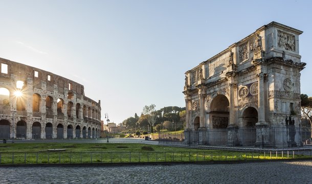 Colosseum and Arch of Constantine at sunrise, Rome, Italy