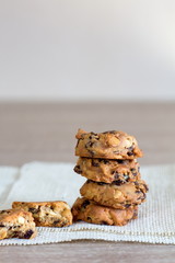 Fresh baked chocolate chip cookies on rustic wooden table,Pile of chocolate chip cookies.
