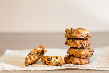 Fresh baked chocolate chip cookies on rustic wooden table,Pile of chocolate chip cookies.