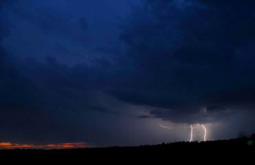 Blue sky with Sunset Lightning