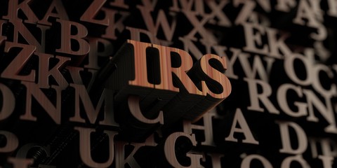 Irs - Wooden 3D rendered letters/message.  Can be used for an online banner ad or a print postcard. - obrazy, fototapety, plakaty