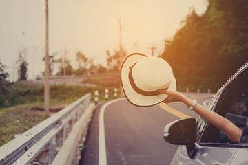 Asain woman traveler with hatchback car with beautiful mountain