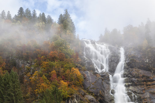 Nardis Waterfall on foggy Autumn day, Trentino Alto Adige, Italy